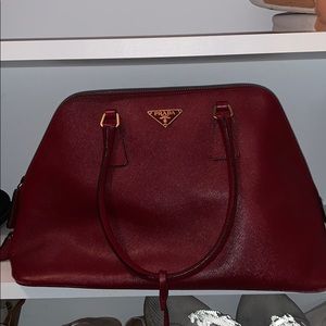 Red leather Prada handbag